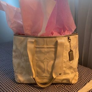 Coach bag.  White with silver trim.  Regular and shoulder strap. Clean!